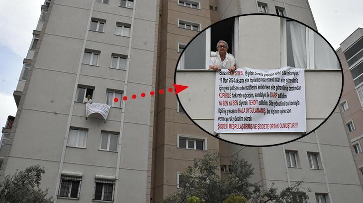 İzmir’de yaşadığı apartmanda saldırıya uğradı! Sesini duyurmak için pankart astı