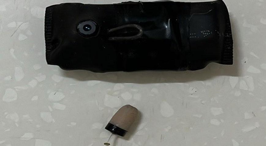 Ehliyet sınavında hazırladığı düzenekle yakalandı